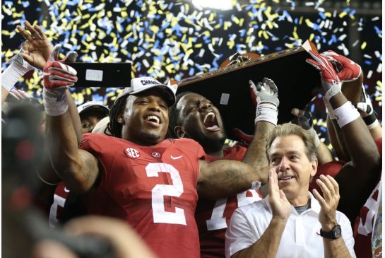 Alabama Crimson Tide running back Derrick Henry celebrates with head coach Nick Saban following their win over the Florida Gators 29-15 in the 2015 SEC championship game