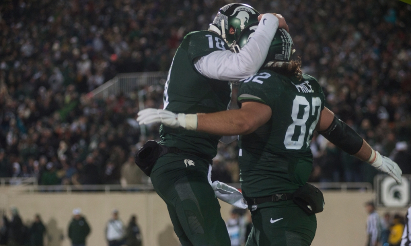 Michigan State takes division with 55-16 rout of Penn State