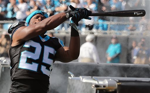 2015 Panthers defender Bene Benwikere swings a bat as he takes the field to play the Atlanta Falcons in an NFL football game in Charlotte N.C. The Panthers deny that any member of the team taunted New York Giants wide receiv