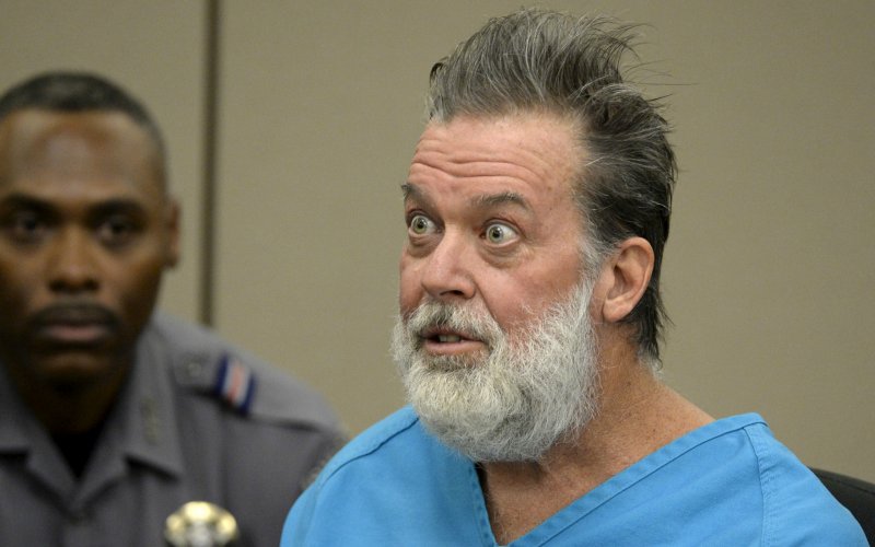 Robert Lewis Dear 57 accused of shooting three people to death and wounding nine others at a Planned Parenthood clinic in Colorado last month attends his hearing to face 179 counts of various criminal charges at an El Paso County court in Colorado Spri