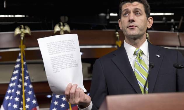 Paul Ryan of Wis. quotes testimony from Homeland Security Secretary Jeh Johnson and FBI Director James Comey during a news briefing on Capitol Hill in Washington Thursday Nov. 19 2015 where he spoke about refugees Syria and