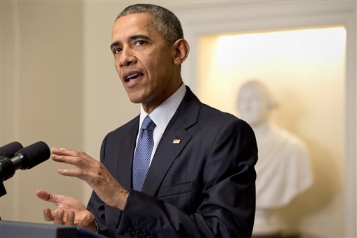 President Barack Obama speaks about the Paris climate agreement from the Cabinet Room of the White House in Washington Saturday Dec. 12 2015