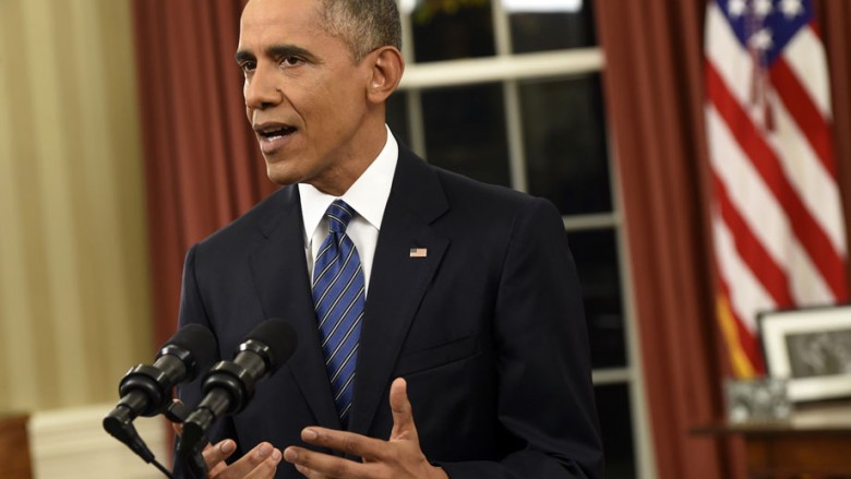 President Barack Obama addresses the nation from the Oval Office at the White House in Washington Sunday night Dec. 6 2016