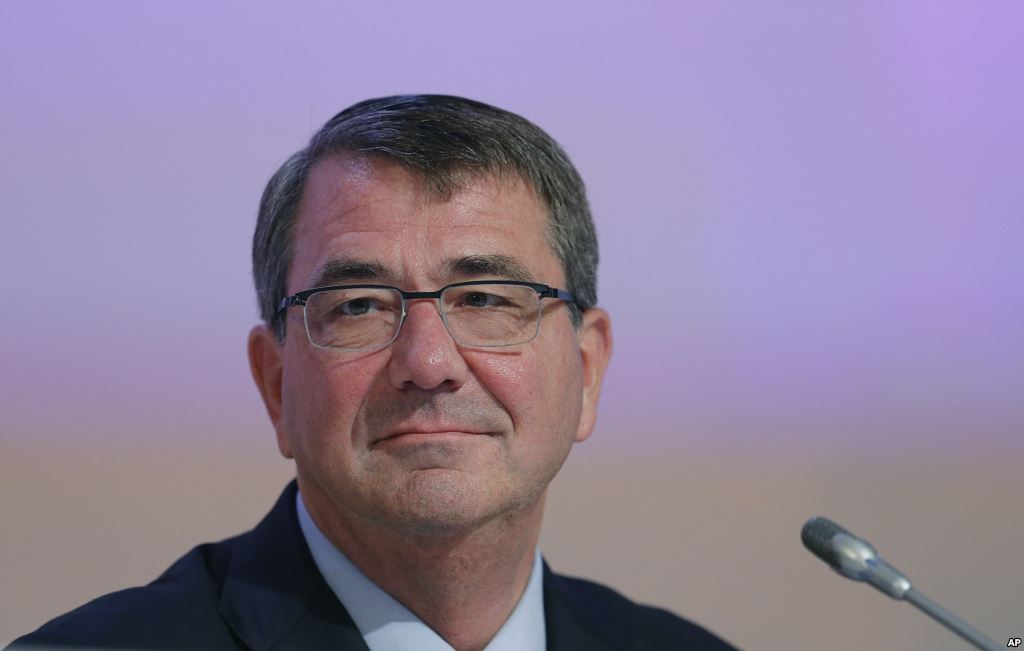 FILE- U.S. Secretary of Defense Ashton Carter delivers a speech during the 14th International Institute for Strategic Studies Shangri-la Dialogue or IISS Asia Security Summit