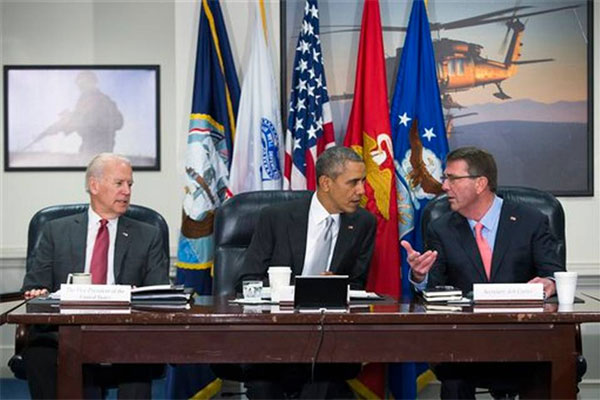 President Obama sits with Vice President Biden and talks with Defense Secretary Ah Carter during a meeting with the National Security Council about the fight against the Islamic State group Monday Dec. 14 2015 at the Pentagon