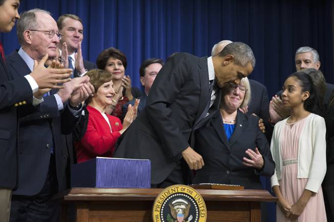 Obama to sign education law rewrite; power shift to states