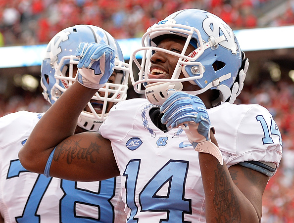 RALEIGH NC- NOVEMBER 28 Quinshad Davis #14 of the North Carolina Tar Heels sticks out his tongue as he celebrates after scoring a touchdown against the North Carolina State Wolfpack during their game at Carter Finley Stadium