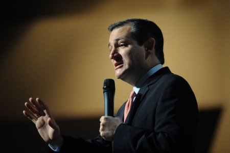 U.S. Republican presidential candidate Ted Cruz takes the stage during Sunday worship at the Christian Life Assembly of God Church in Des Moines Iowa