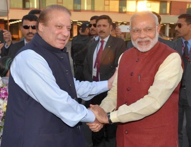 Prime Minister Narendra Modi being greeted by his Pakistani counterpart Nawaz Sharif in Lahore on Friday