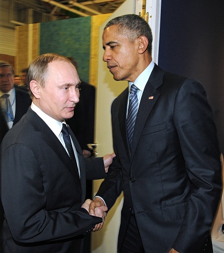 Russian President Vladimir Putin left and U.S. President Barack Obama shake hands at the COP21 UN Conference on Climate Change in Paris France Monday Nov. 30 2015