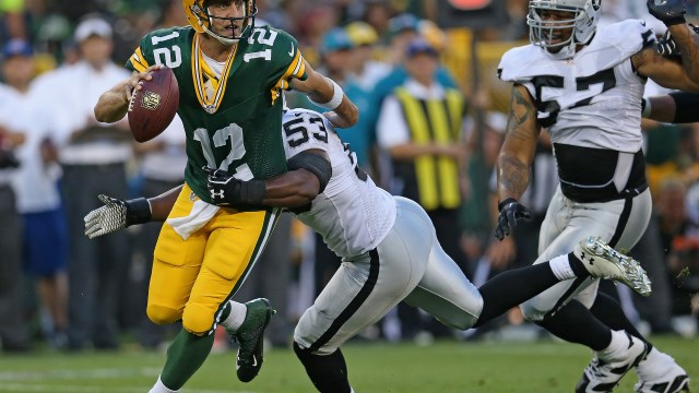 Packers Clinch Playoff Spot, Hold Off Oakland 30-20