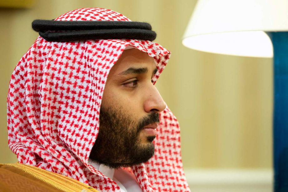 Saudi Arabian Deputy Crown Prince Mohammed bin Salman listens in the Oval Office of the White House in Washington during a meeting between Saudi Arabian Crown Prince Mohammed bin Nayef and President Barack Obama. S