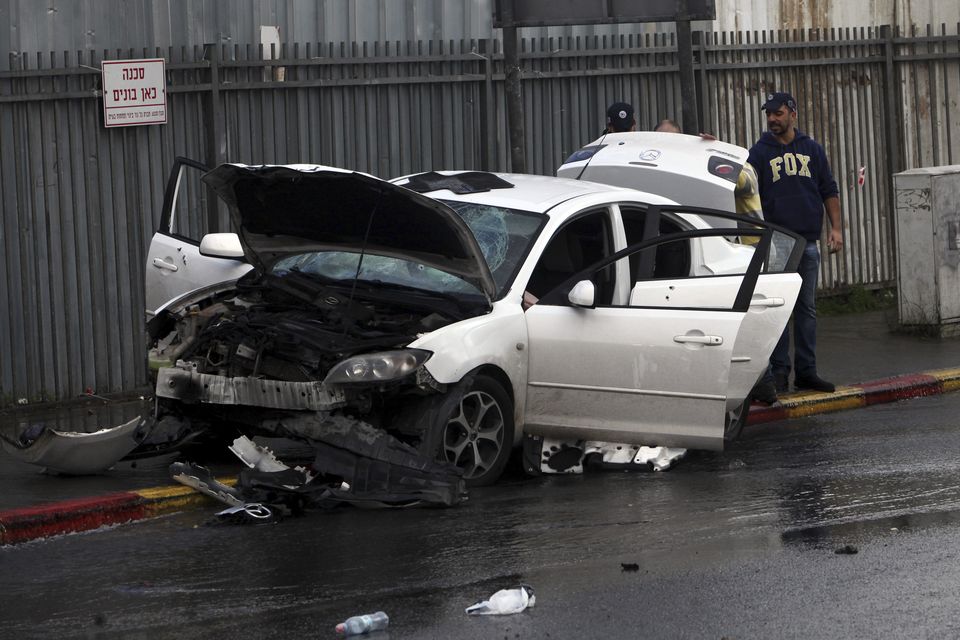 Police Palestinian dead after ramming Israelis wounding 9