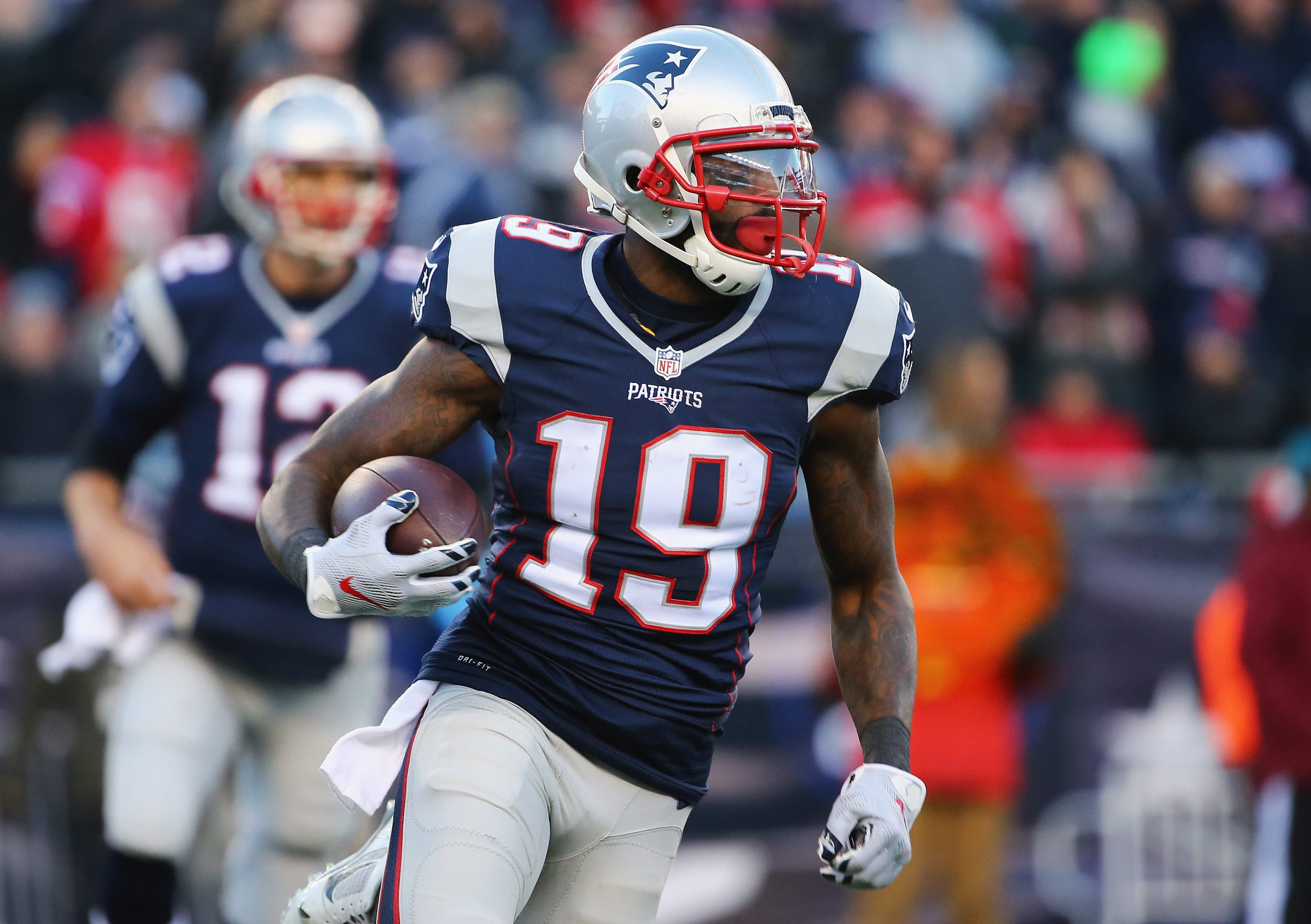 Brandon La Fell of the New England Patriots runs with the ball during the second half against the Tennessee Titans at Gillette Stadium on Sunday in Foxboro Massachusetts