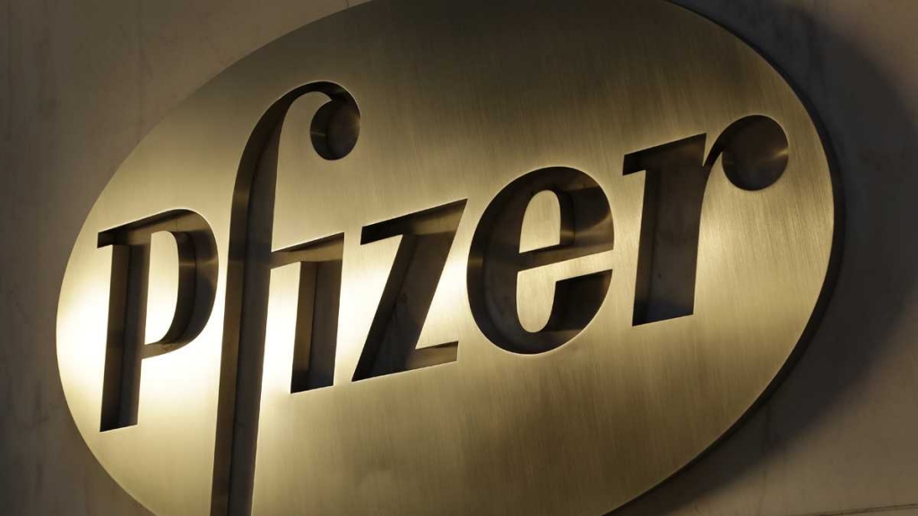 The Pfizer logo is displayed at world headquarters Monday Nov. 23 2015 in New York. Pfizer and Allergan will join in a $160 billion deal to create the world's largest drugmaker