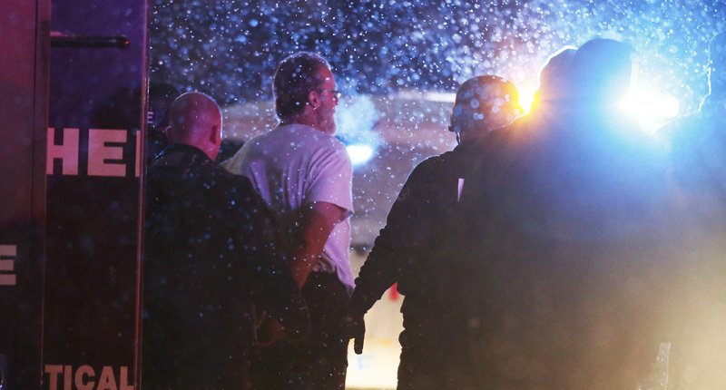 A suspect is taken into custody outside a Planned Parenthood center in Colorado Springs