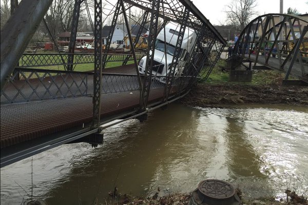 Truck driver disregards signage; destroys iron bridge in Paoli