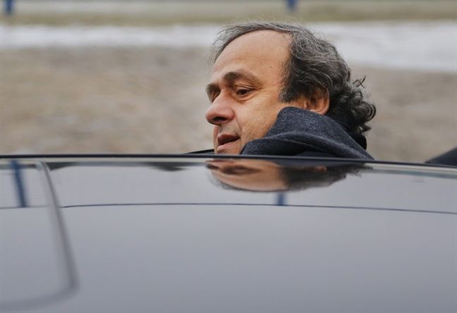 Platini gets into a car after a visit to the football arena in Minsk Belarus. Sepp Blatter and Michel Platini have been banned for 8 years the FIFA ethics committee said Monday Dec. 21 2015