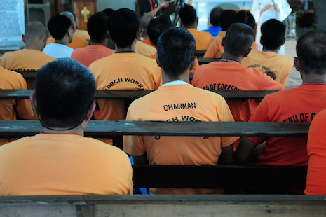 Inmates attend a Mass in a Philippine prison