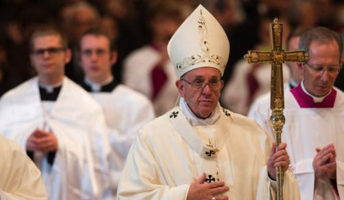 Pope Francis leaves at the end of a Mass for families in St. Peter's Basilica at the Vatican. Credit AP