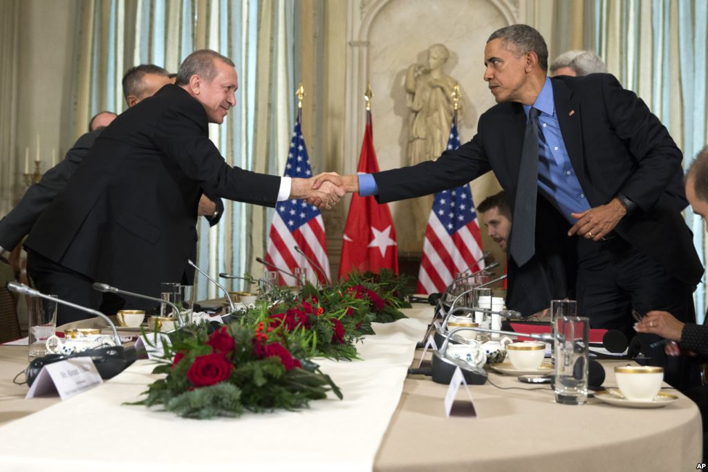 President Barack Obama right shakes hands with Turkish President Recep Tayyip Erdogan after a bilateral meeting in Paris on Tuesday Dec. 1 2015