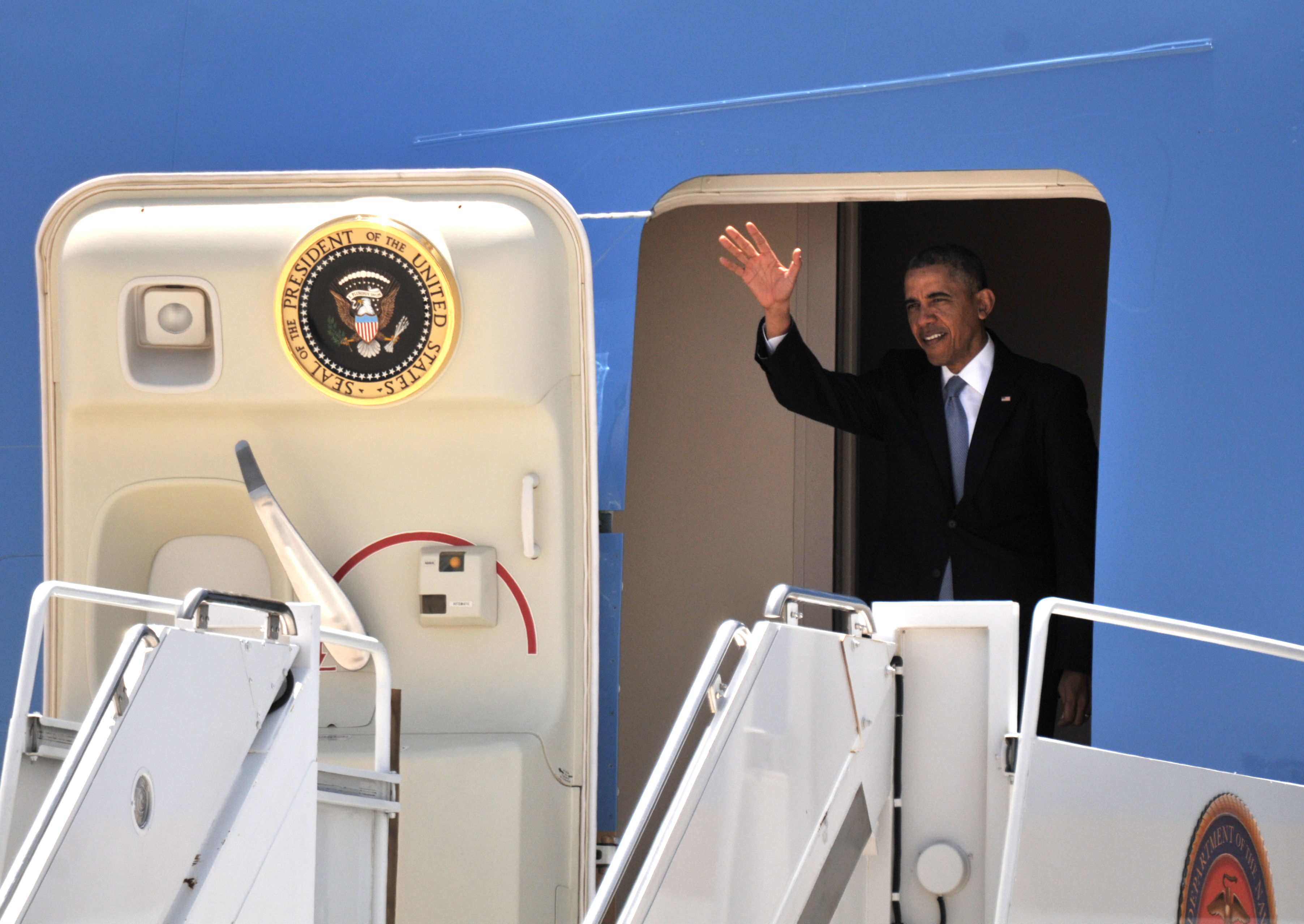 President Obama waves to a crowd gathered for his arrival at MCAS Miramar on Thursday