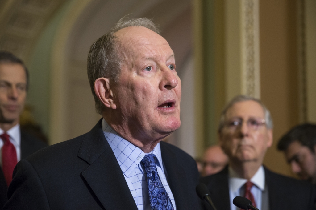 Sen. Lamar Alexander R-Tenn. chairman of the Senate Health Education Labor and Pensions Committee is joined by Senate Majority Leader Mitch Mc Connell R-Ky. right as he speaks to reporters after the Senate voted overwhelmingly to end debate on the