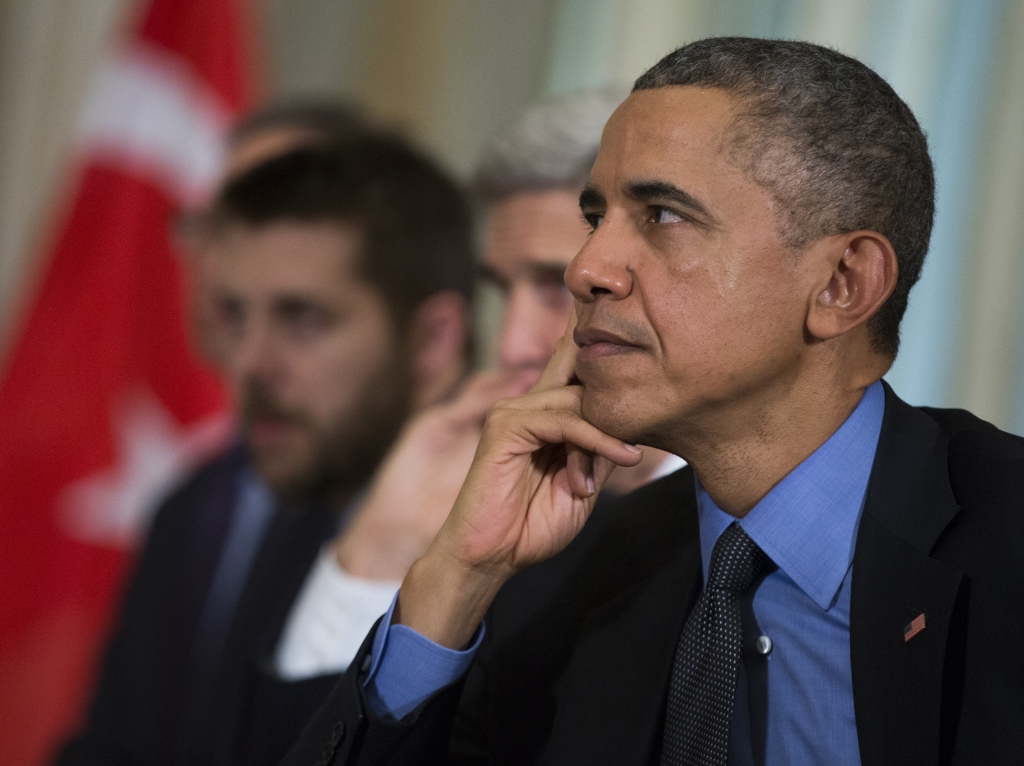 President Obama listens to Turkish President Recep Tayyip Erdogan during a bilateral meeting in Tuesday in Paris.    Evan Vucci    
  AP