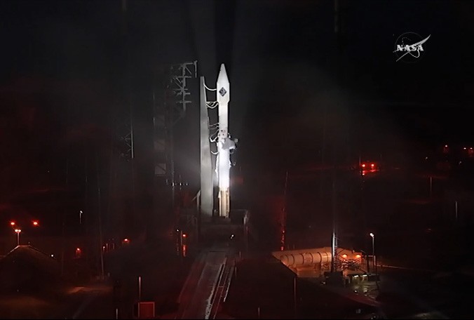 An Atlas V rocket carrying Orbital ATK's Cygnus spacecraft arrives at the launch pad Wednesday Dec. 2 2015 at Cape Canaveral Air Force Station ahead of a launch scheduled Thursday to the International Space Station