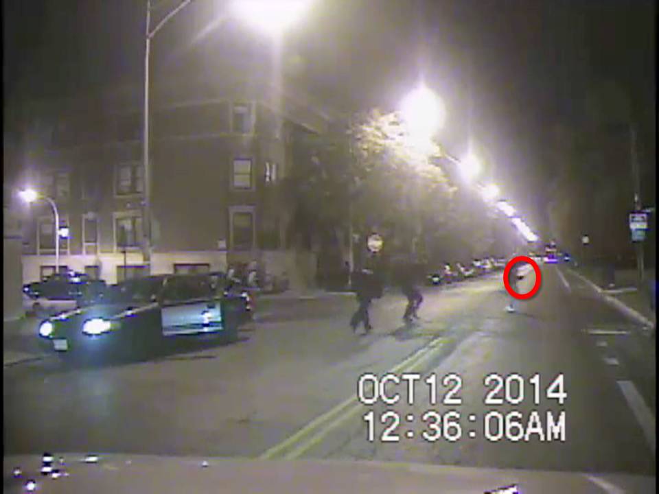 The Cook County State's Attorney says this enhanced image from a dash cam video shows Ronald Johnson carrying a gun