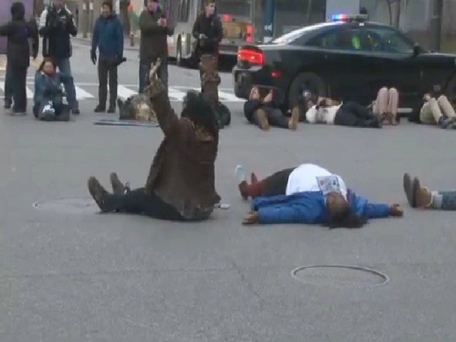 Protesters block East 9th and Lakeside in downtown Cleveland