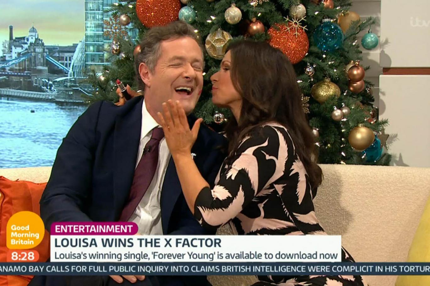 Pucker up Piers Morgan gets a peck on the cheek from Susanna Reid ITV