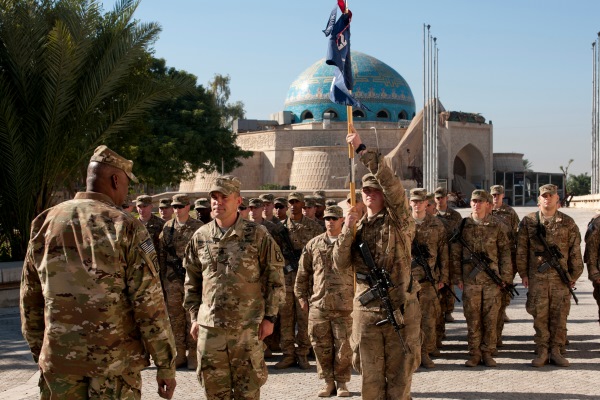 U.S. Army Gen. Lloyd Austin left orders Alpha Company 2nd Battalion 22nd Infantry Regiment 1st Brigade Combat Team 10th Mountain Division, to order-arms during a visit to Baghdad Nov. 25 2015