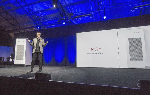 RINGO H.W. CHIU						Credit AP				Tesla Motors Inc. CEO Elon Musk unveils the company’s Powerpack battery earlier this year in Hawthorne Calif