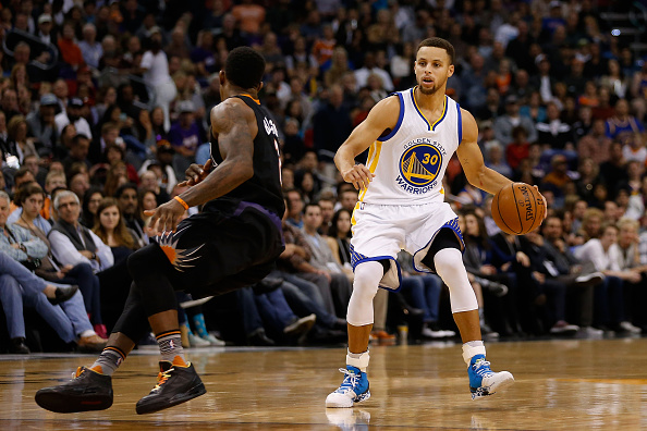 Golden State Warriors&#039 Shaun Livingston right drives the ball against Phoenix Suns&#039 Devin Booker during the first half of an NBA basketball game Wednesday Dec. 16 2015 in Oakland California