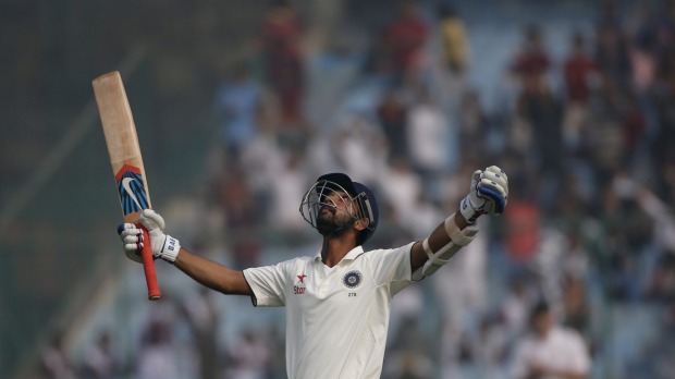 Rare highlight Ajinkya Rahane raises his bat after scoring a a century against South Africa