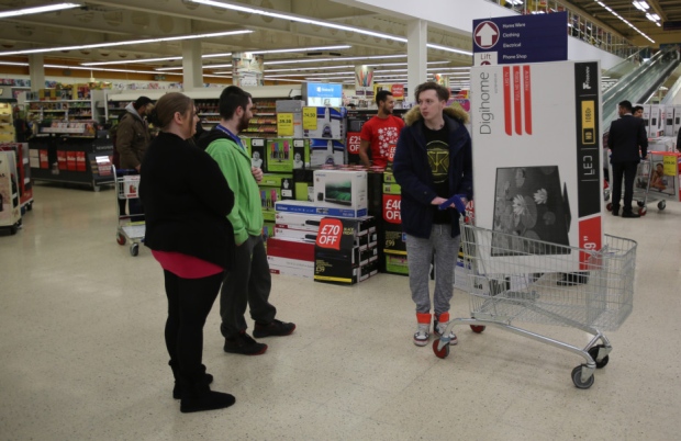 Members of the public at Tesco Extra in Sheffield this morning at 5am getting their hands on the Black Friday bargains. Tesco staggered the entry of shoppers preventing chaotic scenes like last years pre Christmas sales