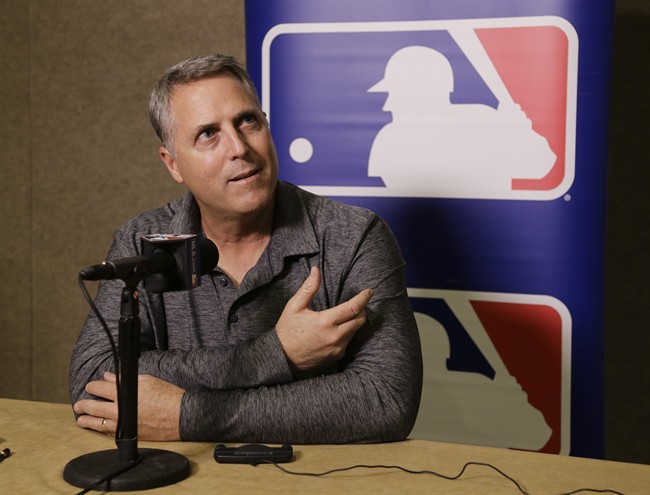 Cincinnati Reds manager Bryan Price talks with reporters at the Major League Baseball winter meetings Monday Dec. 7 2015 in Nashville Tenn