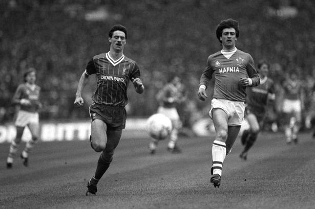 Reds&#x27 Ian Rush and Blues captain Kevin Ratcliffe during the Liverpool v Everton League Cup Final at Wembley 1984