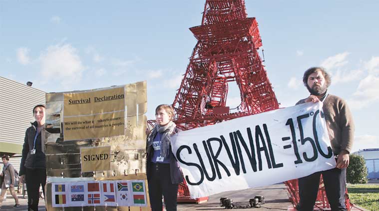 Representatives of NGOs display a banner in Paris Friday