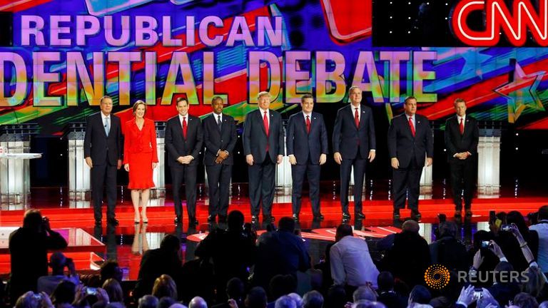 Republican U.S. presidential candidates pose before the start of the Republican presidential debate in Las Vegas