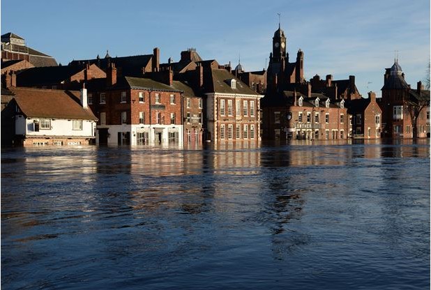 Riverside properties next to the swollen River Ouse in York after the River Foss and Ouse burst their banks