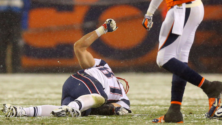 Rob Gronkowski slumped to the frozen turf after hurting his knee in the fourth quarter