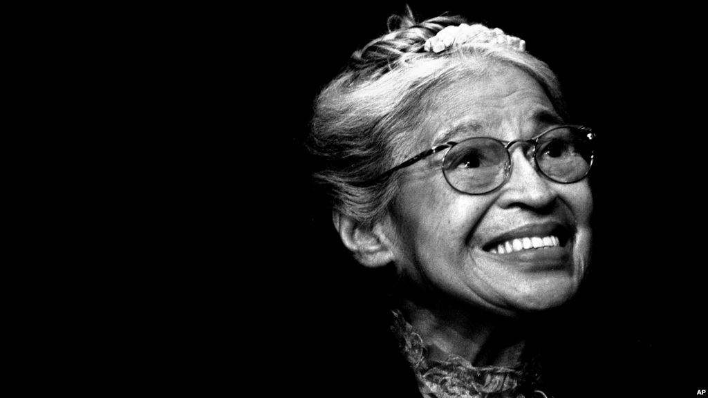 Rosa Parks smiles during a ceremony where she received the Congressional Medal of Freedom in Detroit,Nov. 28 1999