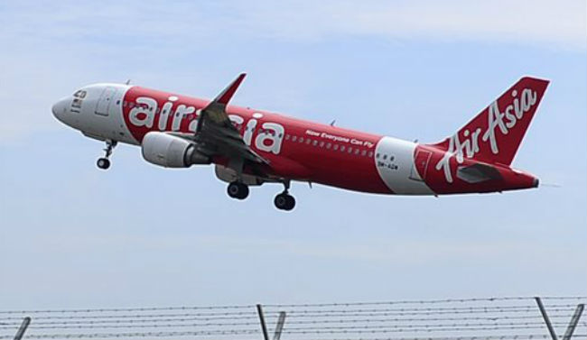 Air Asia A320-200 plane takes off from Kuala Lumpur International Airport 2 in Sepang Malaysia. An Air Asia plane with 162 people on board went missing on Sunday Dec. 28 2014 while flying over the Java Sea after taking off