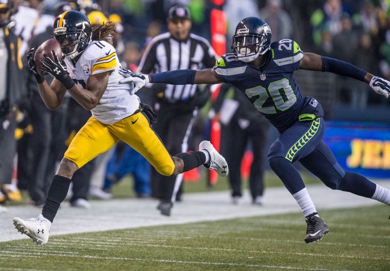 Markus Wheaton of the Pittsburgh Steelers hauls in a catch behind Jeremy Lane of the Seattle Seahawks during Sundays NFL game at Century Link Field