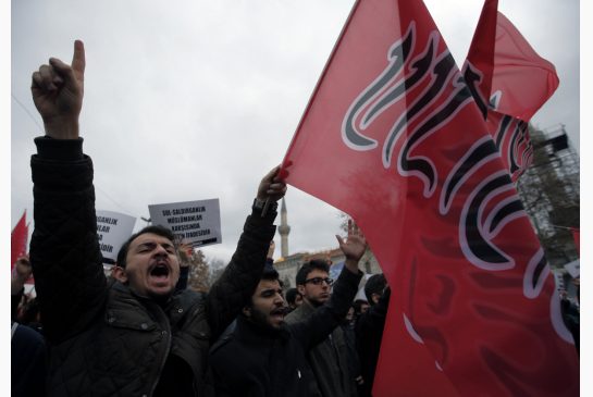 Members of a pro Islamic group shout slogans Tuesday in Istanbul to protest against Russia and in solidarity with groups fighting against the Syrian regime