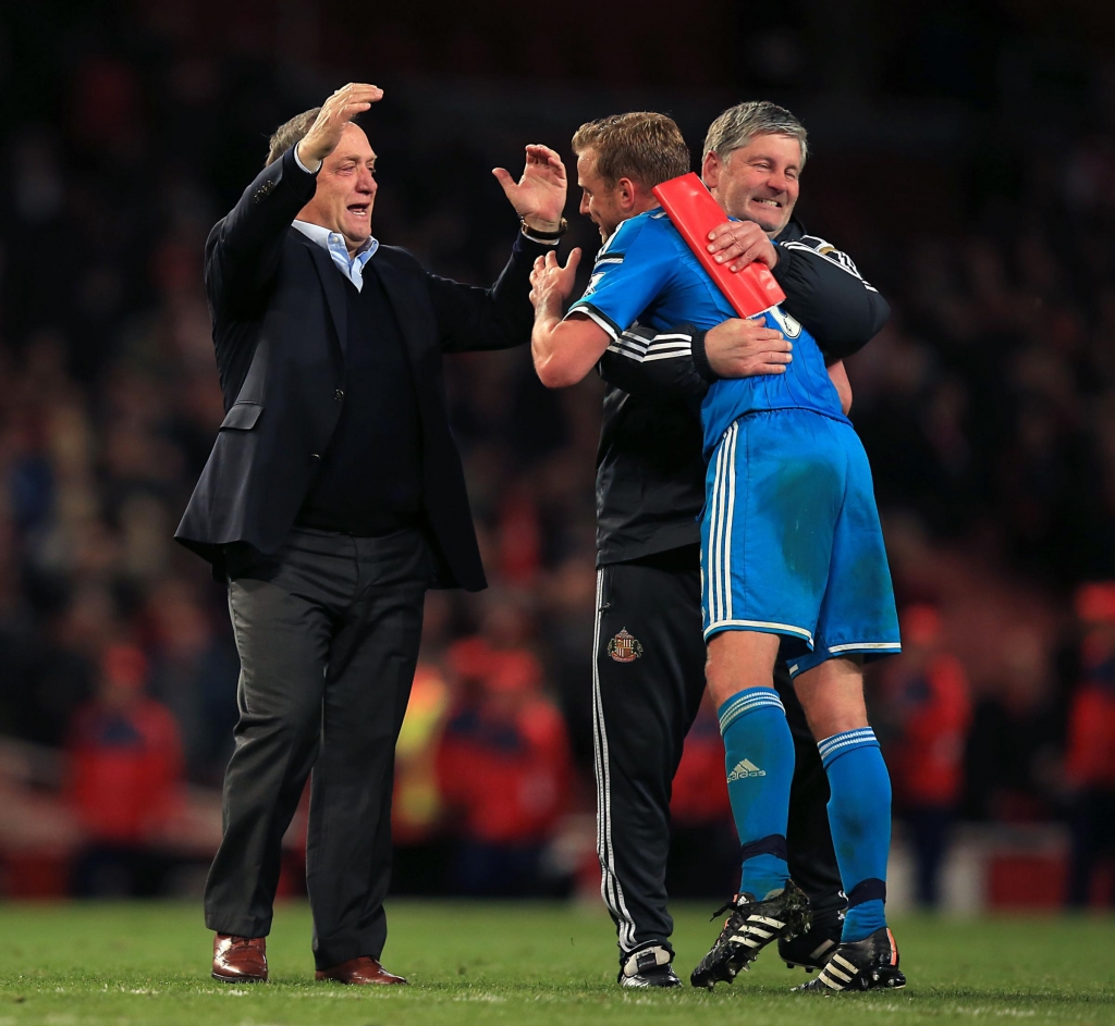 Repeat? Former Sunderland boss Dick Advocaat and Paul Bracewell celebrate with player Lee Cattermole after the Black Cats sealed the result to keep them in the Premier League in May