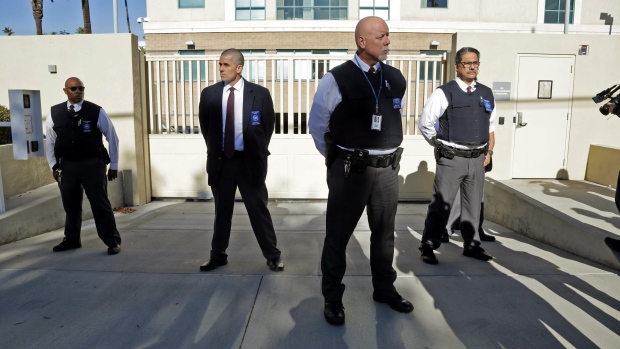 Security was tight after a car carrying Enrique Marquez Jr. arrived at U.S. District Court in Riverside Calif. on Thursday