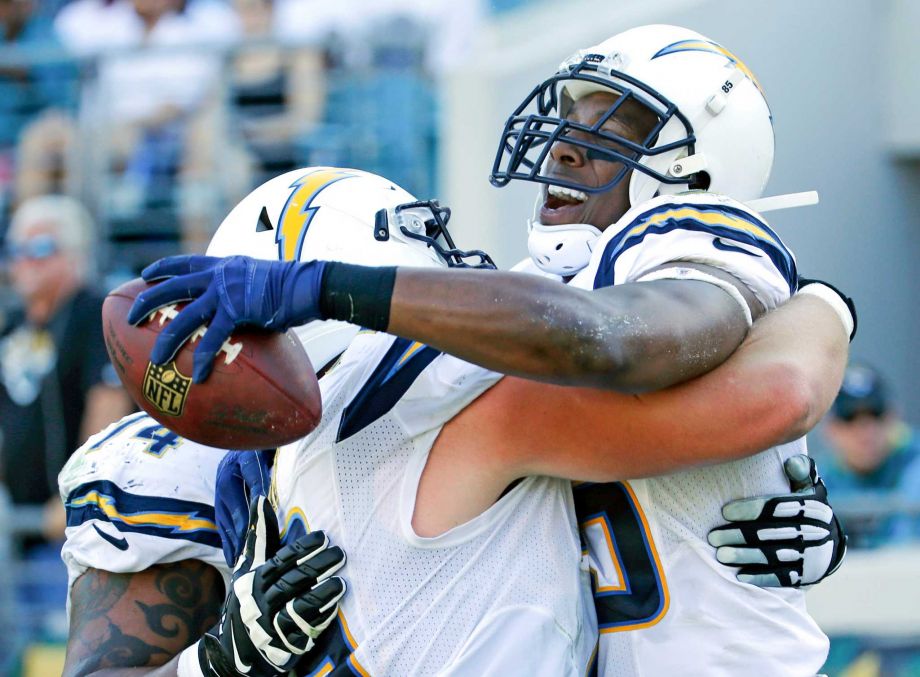 San Diego Chargers tight end Antonio Gates right celebrates with teammates after scoring a touchdown against the Jacksonville Jaguars during the first half of an NFL football game in Jacksonville Fla. Sunday Nov. 29 2015